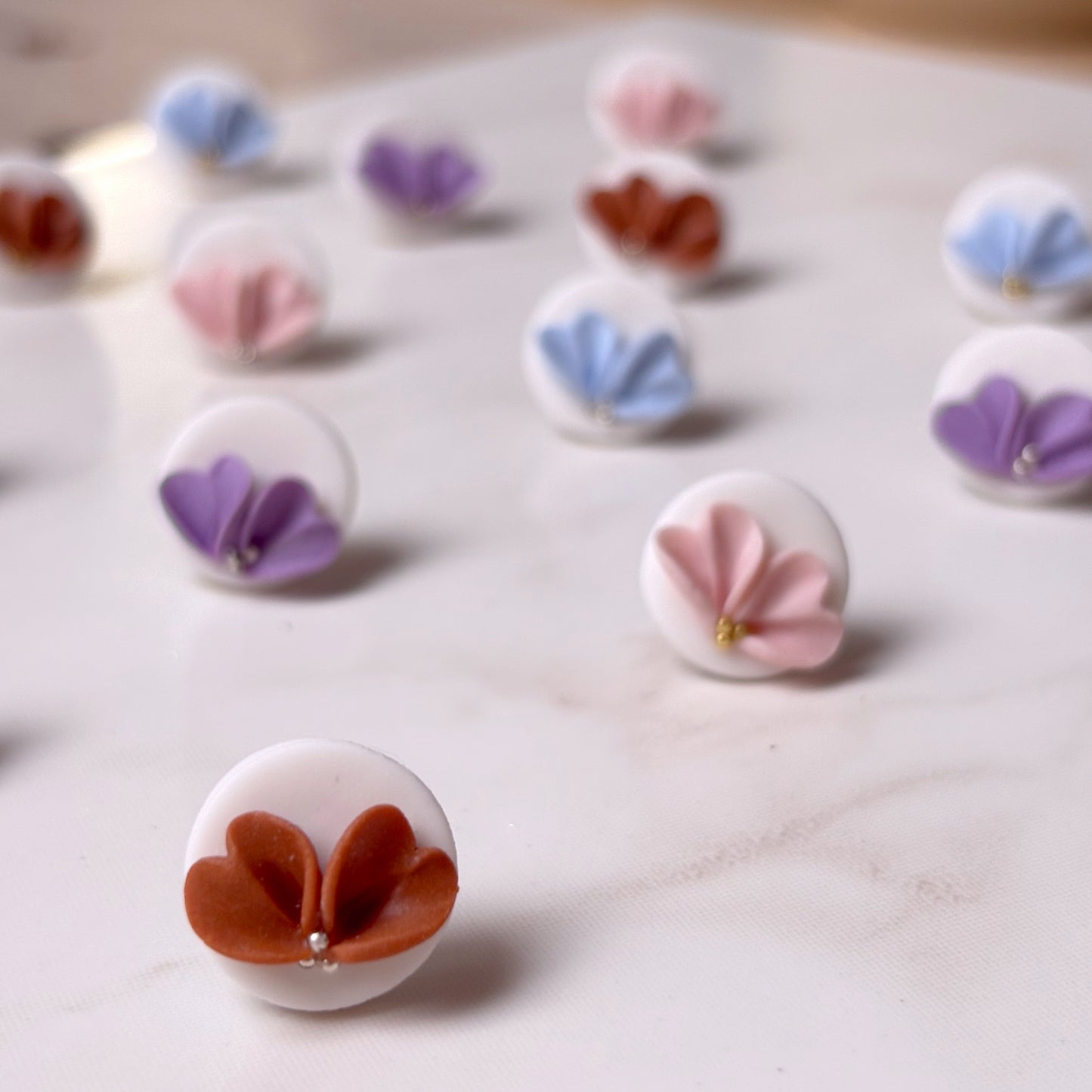 Blossom Stecker